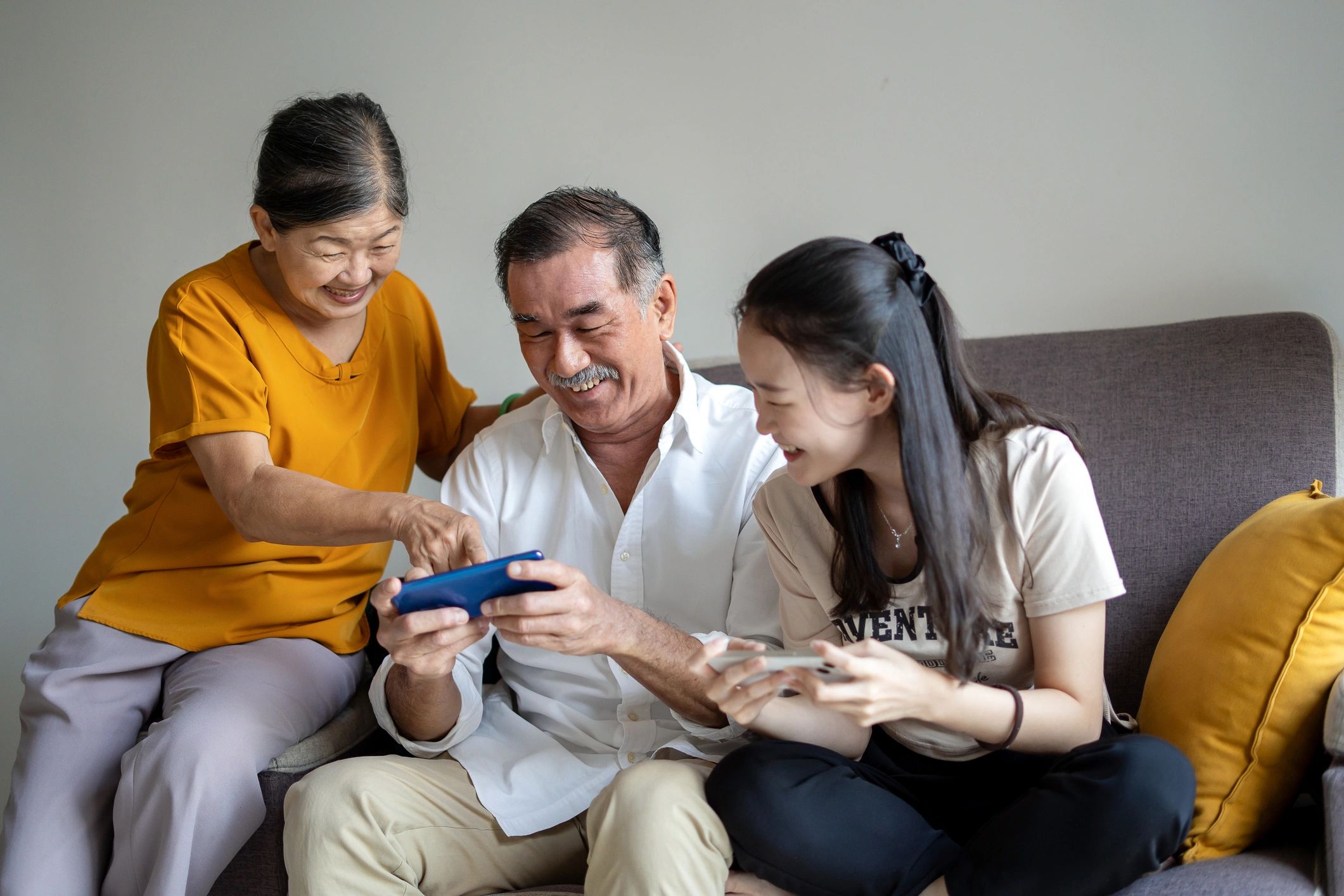 Mobile gamers celebrating victory
